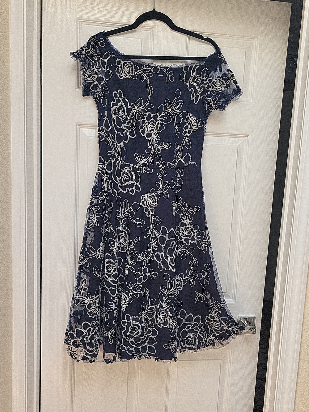 Alex Marie Navy Dress with White Floral Lace Off-Shoulder